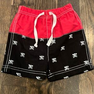 Cute! Size 9 month swim trunks! Pirate Puppy Print!